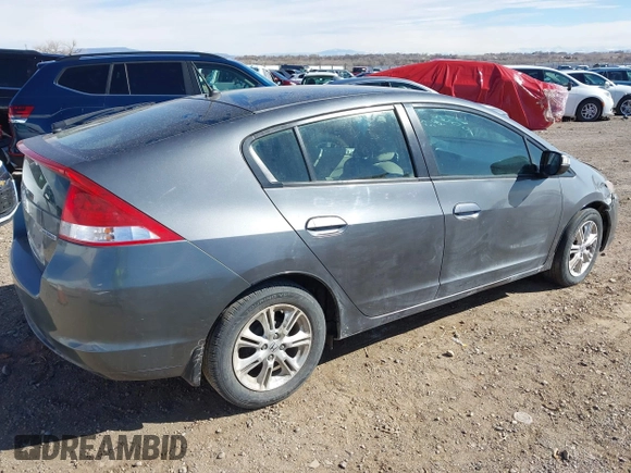 2011 Honda Insight EX with VIN JHMZE2H77BS006244, listed as a IAAI auction lot 41774240 with Not Provided miles and . Bid and sale history available at DreamBid. Image 4.