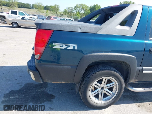 2005 Chevrolet Avalanche Z71 with VIN 3GNEK12Z95G177934, listed as a IAAI auction lot 42645320 with 195,523 mi miles and . Bid and sale history available at DreamBid. Image 15.