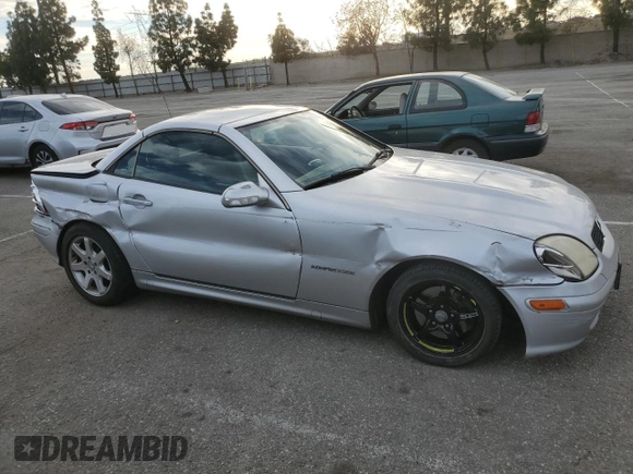 2001 Mercedes-Benz SLK 230 Kompressor with VIN WDBKK49F21F193606, listed as a Copart auction lot 47139945 with 156,424 mi miles and Salvage title. Bid and sale history available at DreamBid. Image 4.