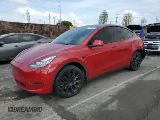 2021 Tesla Model Y Long Range with VIN 5YJYGDEEXMF217816, listed as a Copart auction lot 51008665 with 57,392 mi miles and Salvage Title. Bid and sale history available at DreamBid. Image 1.
