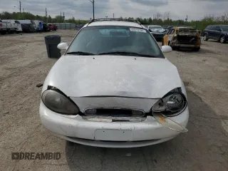 1999 Mercury Sable z VIN 1MEFM58U7XA652331, wystawiony jako Copart lot #49919194 z przebiegiem 143 835 mil mil oraz Szkody całkowita. Historia ofert i sprzedaży dostępna na DreamBid. Obrazek 5.