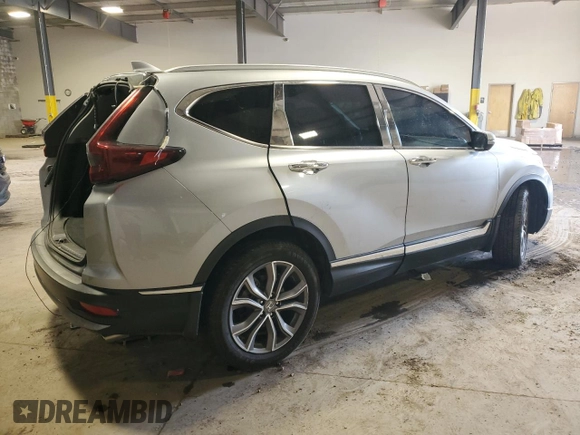 2021 Honda CR-V Touring z VIN 2HKRW2H98MH610340, wystawiony jako Copart lot #56416665 z przebiegiem 91 400 mil mil oraz Szkoda całkowita • Salvage title. Historia ofert i sprzedaży dostępna na DreamBid. Obrazek 3.