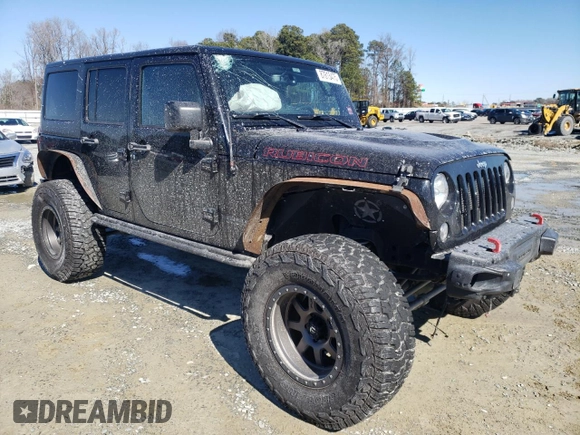 2016 Jeep Wrangler Unlimited Rubicon Hard Rock with VIN 1C4BJWFG9GL209484, listed as a Copart auction lot 87815475 with 85,729 mi miles and Salvage Title. Bid and sale history available at carsss.com. Image 4.