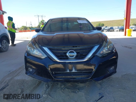 2018 Nissan Altima SV with VIN 1N4AL3APXJC297759, listed as a IAAI auction lot 41758613 with 77,527 mi miles and . Bid and sale history available at carsss.com. Image 13.