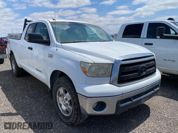 2011 Toyota Tundra with VIN 5TFUY5F1XBX198815, listed as a IAAI auction lot 42571444 with 281,114 mi miles and . Bid and sale history available at DreamBid. Image 6.