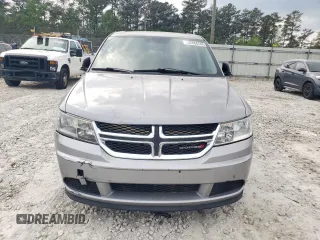 2015 Dodge Journey SE z VIN 3C4PDCAB5FT675083, wystawiony jako Copart lot #52680595 z przebiegiem 116 878 mil mil oraz Czysty tytuł • Clean title. Historia ofert i sprzedaży dostępna na DreamBid. Obrazek 5.