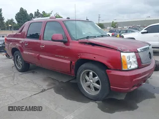 2004 Cadillac Escalade EXT z VIN 3GYEK62N64G127746, wystawiony jako IAAI lot #42135228 z przebiegiem 212 518 mil mil oraz . Historia ofert i sprzedaży dostępna na DreamBid. Obrazek 1.