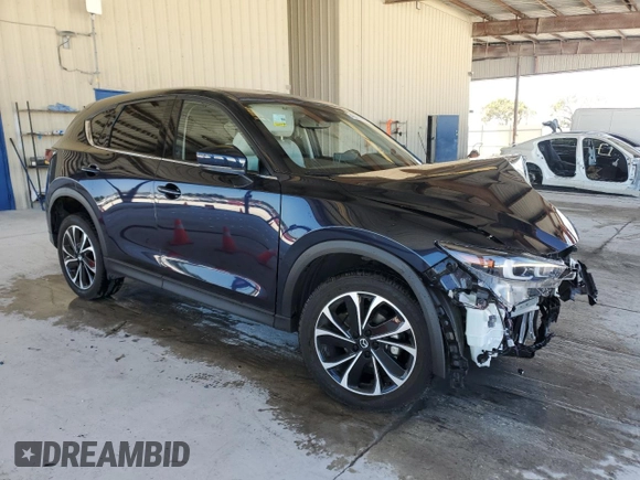 2023 Mazda CX-5 2.5 S Premium Package with VIN JM3KFBDM6P0261800, listed as a Copart auction lot 49881885 with 14,102 mi miles and Non Repairable. Bid and sale history available at carsss.com. Image 4.