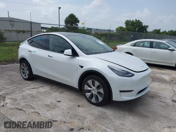 2023 Tesla Model Y Long Range z VIN 7SAYGDEE0PA065534, wystawiony jako IAAI lot #42445868 z przebiegiem 22 638 mil mil oraz . Historia ofert i sprzedaży dostępna na DreamBid. Obrazek 1.