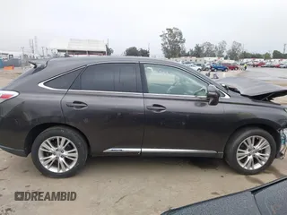 2010 Lexus RX 450h with VIN JTJZB1BA1A2400374, listed as a IAAI auction lot 42189614 with 122,413 mi miles and . Bid and sale history available at DreamBid. Image 13.
