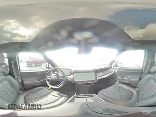 2025 Rivian R1S Adventure z VIN 7PDSGBBA1SN051768, wystawiony jako Copart lot #43838115 z przebiegiem 4875 mil mil oraz Szkoda całkowita • Salvage title. Historia ofert i sprzedaży dostępna na DreamBid. Obrazek 13.