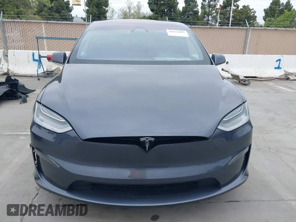 2022 Tesla Model X Plaid with VIN 7SAXCBE6XNF337687, listed as a IAAI auction lot 42035097 with 18,756 mi miles and . Bid and sale history available at DreamBid. Image 13.