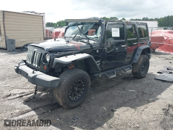2012 Jeep Wrangler Unlimited Sport with VIN 1C4BJWDG8CL120308, listed as a IAAI auction lot 42365817 with 190,619 mi miles and . Bid and sale history available at DreamBid. Image 2.