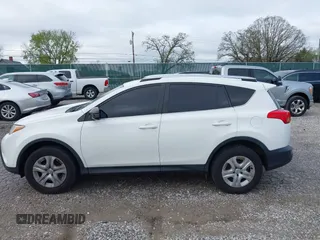 2014 Toyota RAV4 LE with VIN JTMBFREV2EJ006965, listed as a IAAI auction lot 41961470 with 194,881 mi miles and . Bid and sale history available at DreamBid. Image 14.
