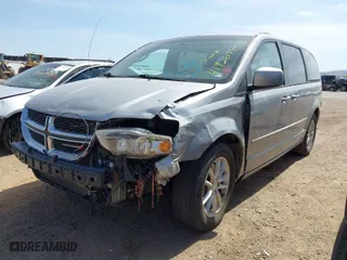 2014 Dodge Grand Caravan SXT with VIN 2C4RDGCG2ER262466, listed as a IAAI auction lot 41928445 with 218,380 mi miles. Bid and sale history available at carsss.com. Image 2.