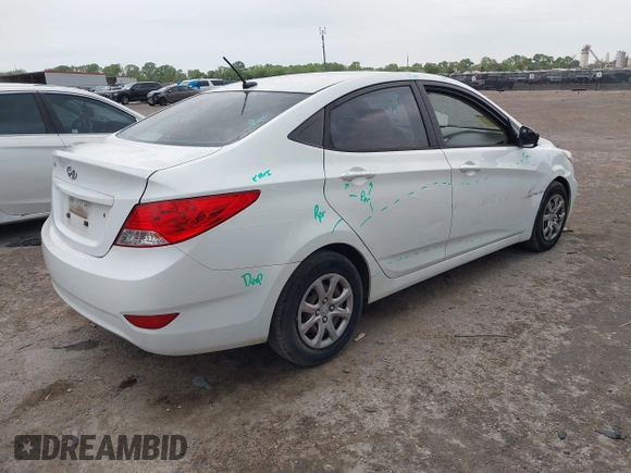 2014 Hyundai Accent GLS with VIN KMHCT4AE5EU649178, listed as a IAAI auction lot 41936729 with 102,737 mi miles. Bid and sale history available at carsss.com. Image 4.