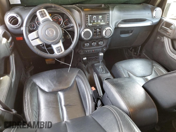 2016 Jeep Wrangler Unlimited Rubicon with VIN 1C4HJWFG4GL107777, listed as a Copart auction lot 48974135 with 118,164 mi miles and Salvage Title. Bid and sale history available at carsss.com. Image 8.