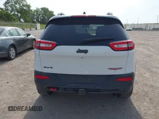 2015 Jeep Cherokee Trailhawk with VIN 1C4PJMBS6FW687718, listed as a IAAI auction lot 42505169 with 122,526 mi miles and . Bid and sale history available at DreamBid. Image 17.