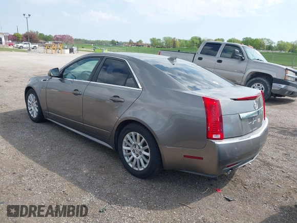 2012 Cadillac CTS Luxury with VIN 1G6DE5E56C0132613, listed as a IAAI auction lot 42116862 with 81,617 mi miles and . Bid and sale history available at DreamBid. Image 3.
