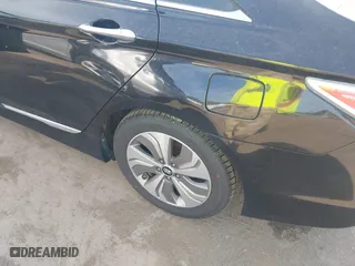 2015 Hyundai Sonata Hybrid Limited with VIN KMHEC4A44FA129122, listed as a IAAI auction lot 42098724 with 140,792 mi miles. Bid and sale history available at carsss.com. Image 6.
