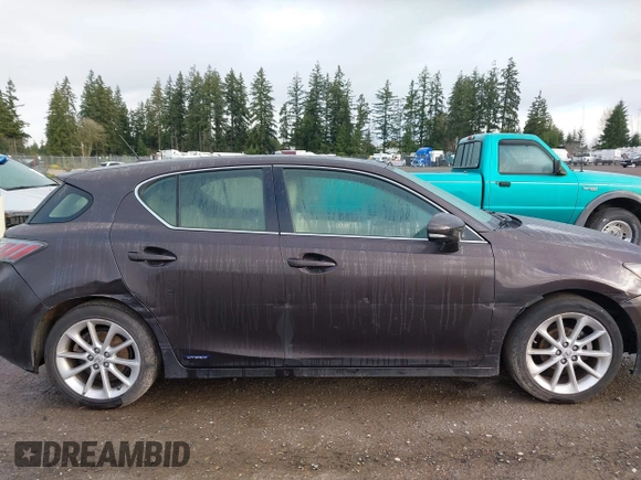 2013 Lexus CT 200h z VIN JTHKD5BH6D2134372, wystawiony jako IAAI lot #41882762 z przebiegiem 182 919 mil mil oraz . Historia ofert i sprzedaży dostępna na DreamBid. Obrazek 13.