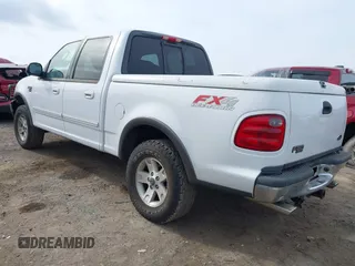 2003 Ford F-150 XLT with VIN 1FTRW08L73KA73945, listed as a IAAI auction lot 41474904 with 122,080 mi miles. Bid and sale history available at carsss.com. Image 3.