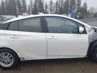 2017 Toyota Prius Prime Plus with VIN JTDKARFP6H3067887, listed as a IAAI auction lot 42008798 with 63,261 mi miles. Bid and sale history available at carsss.com. Image 14.