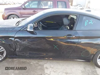 2015 BMW 4 Series 428i с VIN WBA3N3C52FK231502, выставлен на аукционе IAAI как лот 41879256 с пробегом 142 069 миль миль и . История ставок и продаж доступна на DreamBid. Изображение 14.
