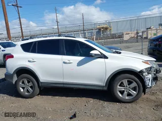 2015 Toyota RAV4 XLE with VIN JTMWFREV9FJ034992, listed as a IAAI auction lot 41922694 with 100,956 mi miles. Bid and sale history available at carsss.com. Image 14.