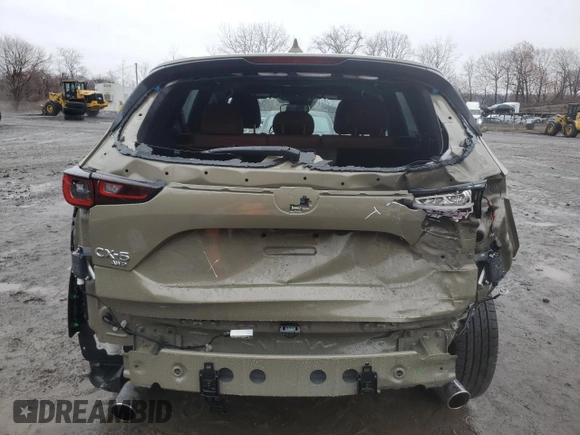2024 Mazda CX-5 2.5 Carbon Turbo with VIN JM3KFBAY5R0419375, listed as a Copart auction lot 82000304 with 7,247 mi miles and Salvage Title. Bid and sale history available at carsss.com. Image 6.