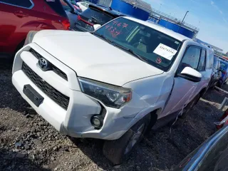 2014 Toyota 4Runner Limited with VIN JTEBU5JR1E5201256, listed as a IAAI auction lot 41674334 with 236,059 mi miles. Bid and sale history available at carsss.com. Image 2.