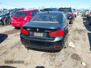 2014 BMW 3 Series 328d xDrive with VIN WBA3D5C54EF147199, listed as a IAAI auction lot 41626737 with 98,281 mi miles. Bid and sale history available at carsss.com. Image 16.
