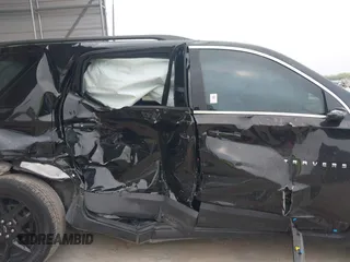 2023 Chevrolet Traverse LT Cloth z VIN 1GNERGKW4PJ303672, wystawiony jako IAAI lot #42162184 z przebiegiem 35 685 mil mil oraz . Historia ofert i sprzedaży dostępna na DreamBid. Obrazek 14.