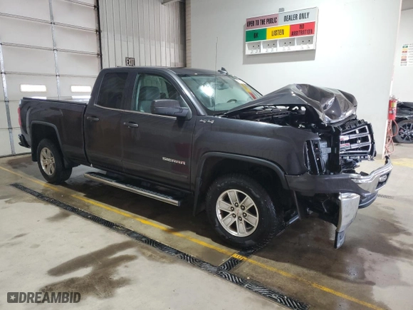 2015 GMC Sierra 1500 SLE with VIN 1GTV2UEC5FZ163158, listed as a Copart auction lot 50871415 with 149,216 mi miles and Salvage Title. Bid and sale history available at carsss.com. Image 4.