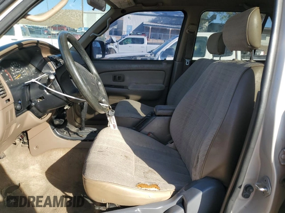 1998 Toyota 4Runner with VIN JT3GM84R3W0035025, listed as a Copart auction lot 73585894 with 203,819 mi miles and Salvage title. Bid and sale history available at DreamBid. Image 7.