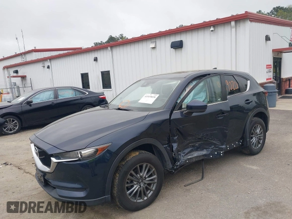 2017 Mazda CX-5 Touring with VIN JM3KFBCL9H0163449, listed as a IAAI auction lot 41919020 with 102,898 mi miles. Bid and sale history available at carsss.com. Image 6.