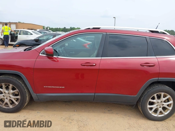 2016 Jeep Cherokee 75th Anniversary with VIN 1C4PJLCB6GW287894, listed as a IAAI auction lot 42435662 with 114,649 mi miles and . Bid and sale history available at DreamBid. Image 14.