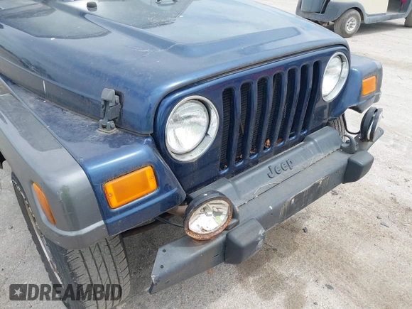 2004 Jeep Wrangler X with VIN 1J4FA39S64P726711, listed as a IAAI auction lot 42227336 with Not Provided miles and . Bid and sale history available at DreamBid. Image 6.