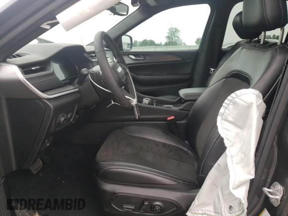 2024 Jeep Grand Cherokee Laredo X with VIN 1C4RJGAG0RC264338, listed as a Copart auction lot 56797895 with 10,755 mi miles and Salvage title. Bid and sale history available at DreamBid. Image 7.