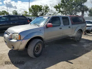2004 Nissan Frontier XE with VIN 1N6ED29X24C436064, listed as a Copart auction lot 58916434 with 277,026 mi miles and Salvage title. Bid and sale history available at DreamBid. Image 1.