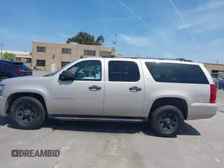 2007 Chevrolet Suburban LS with VIN 1GNFC16027J202168, listed as a IAAI auction lot 42100210 with Not Provided miles and . Bid and sale history available at DreamBid. Image 14.