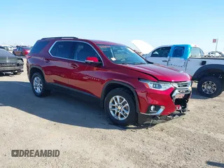 2019 Chevrolet Traverse LT z VIN 1GNERHKW9KJ261773, wystawiony jako IAAI lot #41151848 z przebiegiem 62 824 mil mil oraz . Historia ofert i sprzedaży dostępna na DreamBid. Obrazek 1.