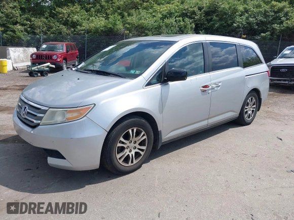 2012 Honda Odyssey EX-L with VIN 5FNRL5H67CB139701, listed as a IAAI auction lot 42233283 with 147,143 mi miles and . Bid and sale history available at DreamBid. Image 18.