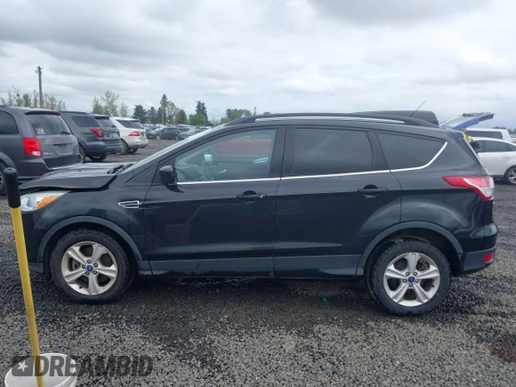 2015 Ford Escape SE with VIN 1FMCU9G98FUA26059, listed as a IAAI auction lot 41991222 with 149,298 mi miles and . Bid and sale history available at DreamBid. Image 15.