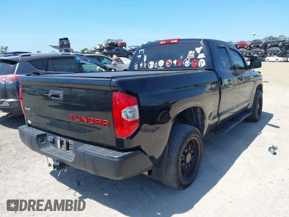 2019 Toyota Tundra SR with VIN 5TFUY5F13KX852912, listed as a IAAI auction lot 42327399 with 124,193 mi miles and . Bid and sale history available at DreamBid. Image 4.