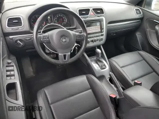 2013 Volkswagen Eos Komfort with VIN WVWBW8AH0DV003581, listed as a Copart auction lot 54498655 with 95,203 mi miles and Salvage Title. Bid and sale history available at DreamBid. Image 8.