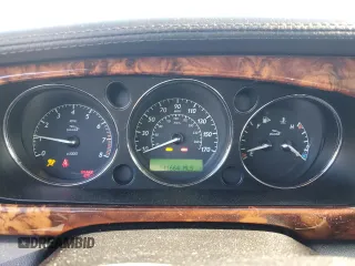 2004 Jaguar XJ VDP with VIN SAJWA74C54SG18384, listed as a Copart auction lot 83081974 with 141,664 mi miles and Salvage Title. Bid and sale history available at carsss.com. Image 9.