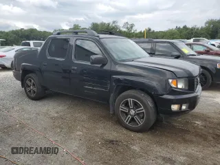 2014 Honda Ridgeline Sport with VIN 5FPYK1F75EB001197, listed as a Copart auction lot 65932295 with 121,862 mi miles and Salvage title. Bid and sale history available at DreamBid. Image 4.
