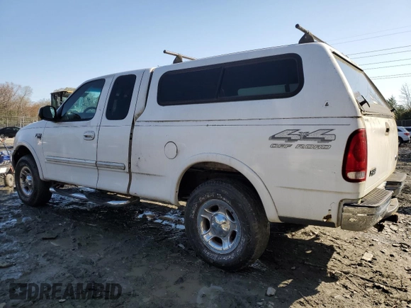 1999 Ford F-150 XL with VIN 1FTRX18L1XNB18305, listed as a Copart auction lot 51336985 with 173,904 mi miles and Clean Title. Bid and sale history available at carsss.com. Image 2.