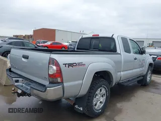 2013 Toyota Tacoma with VIN 5TFUU4EN1DX065356, listed as a IAAI auction lot 41509219 with 122,520 mi miles and . Bid and sale history available at DreamBid. Image 4.